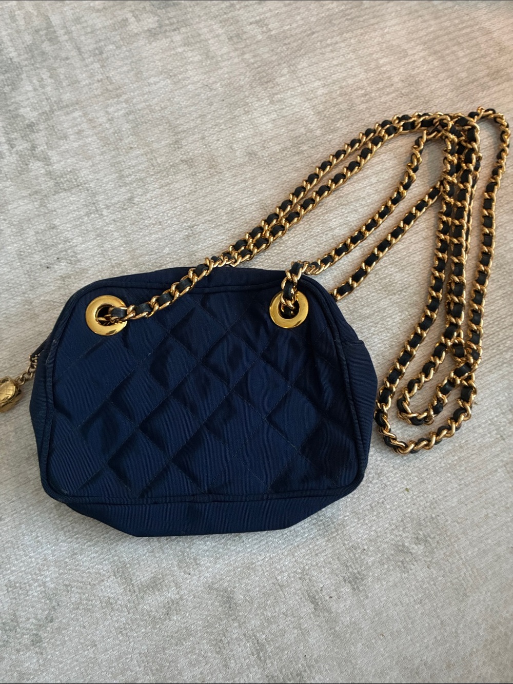 Andrea Carrano blue quilted bag with Gold hardware